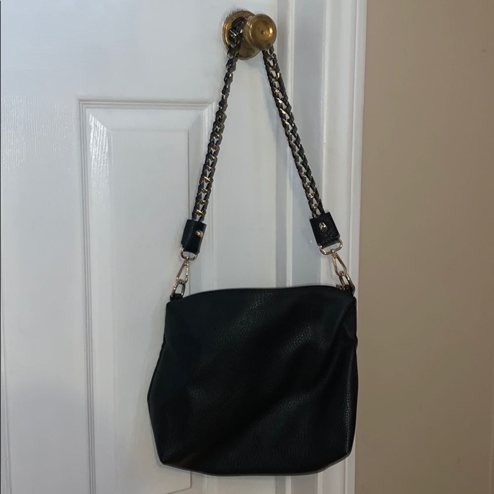 Black and gold chain over the shoulder purse